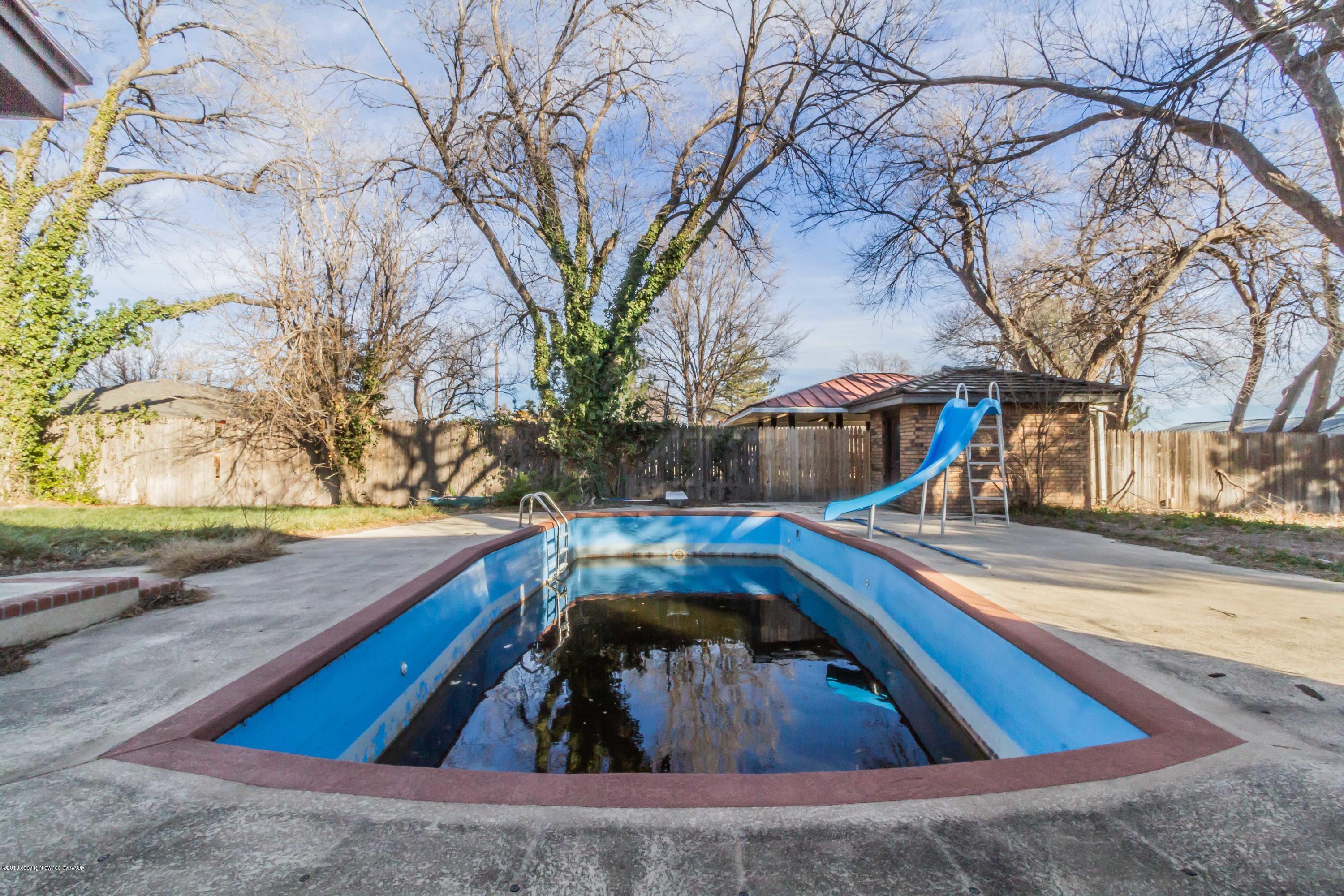 6801 Green Haven Road Amarillo, TX 79110 - Photo 65 of 65 a view of swimming pool with outdoor seating