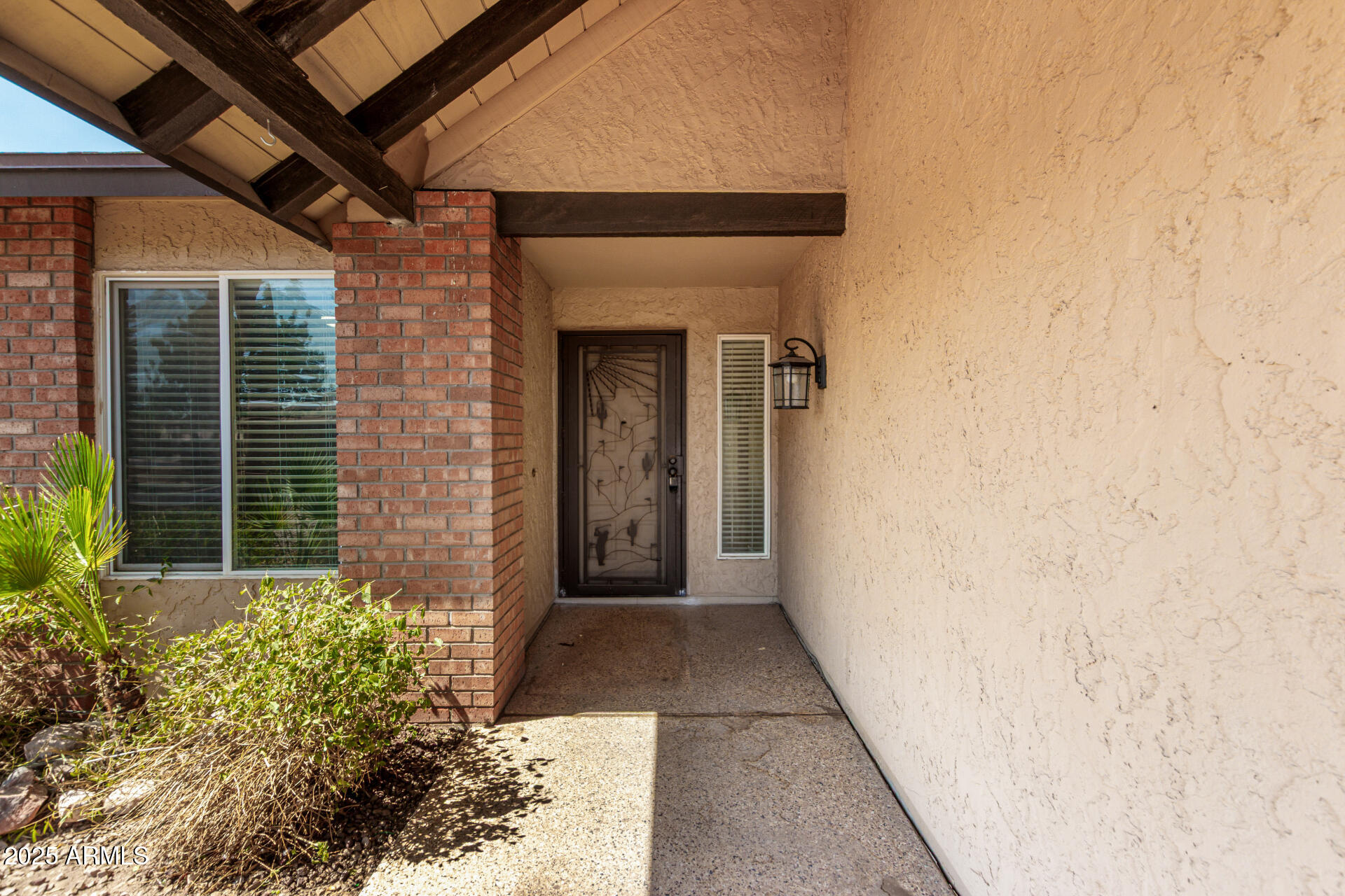 7412 East Ed Rice Avenue Mesa, AZ 85208 - Photo 7 of 36 a view of a entryway door front of house