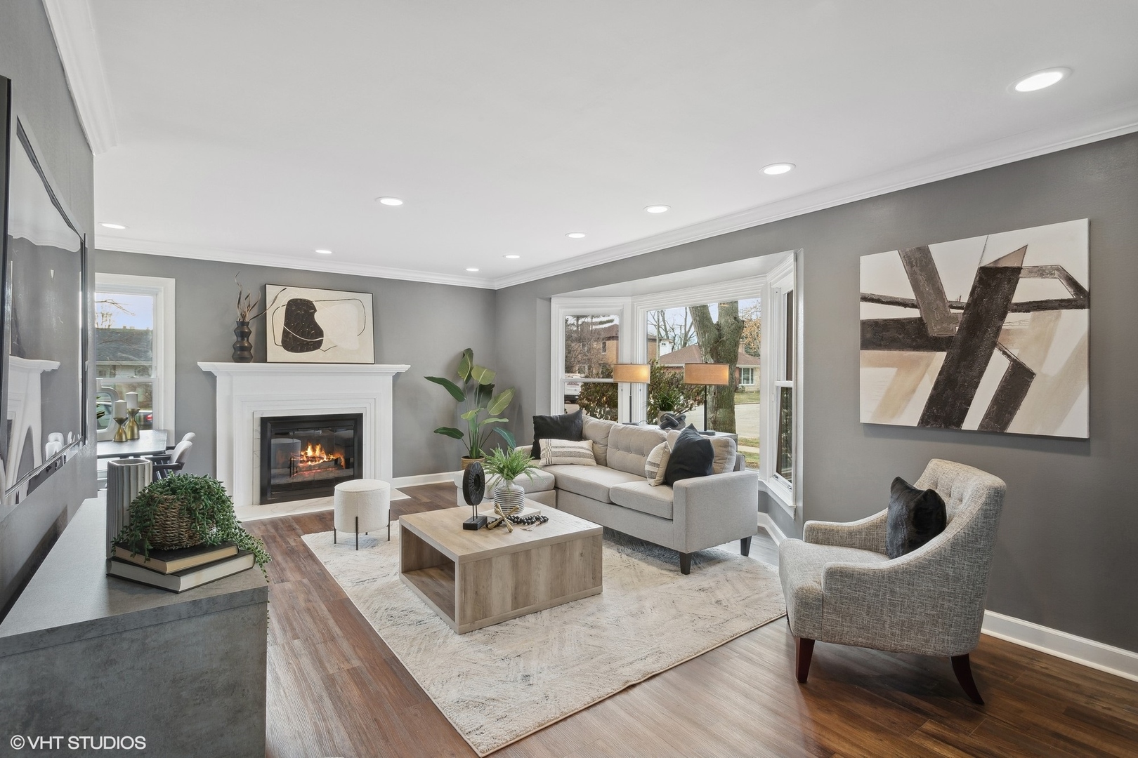 8501 Harding Avenue Skokie, IL 60076 - Photo 2 of 37 a living room with furniture and a fireplace