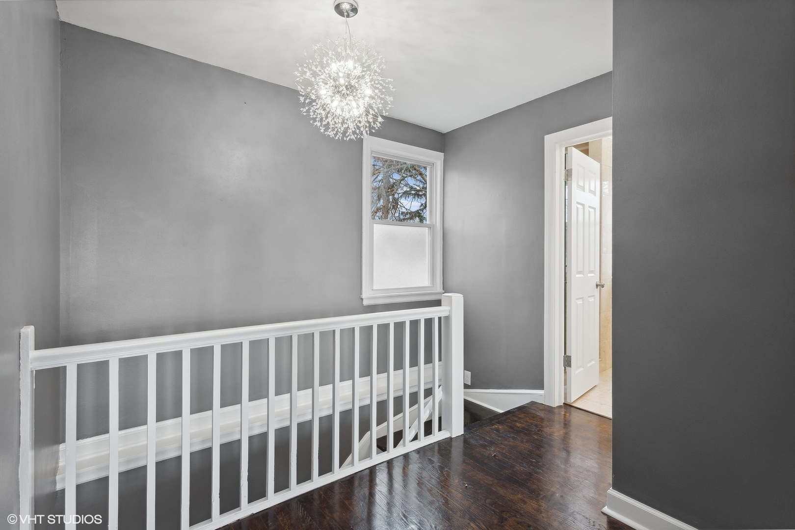 8501 Harding Avenue Skokie, IL 60076 - Photo 26 of 37 a view of entryway with wooden floor