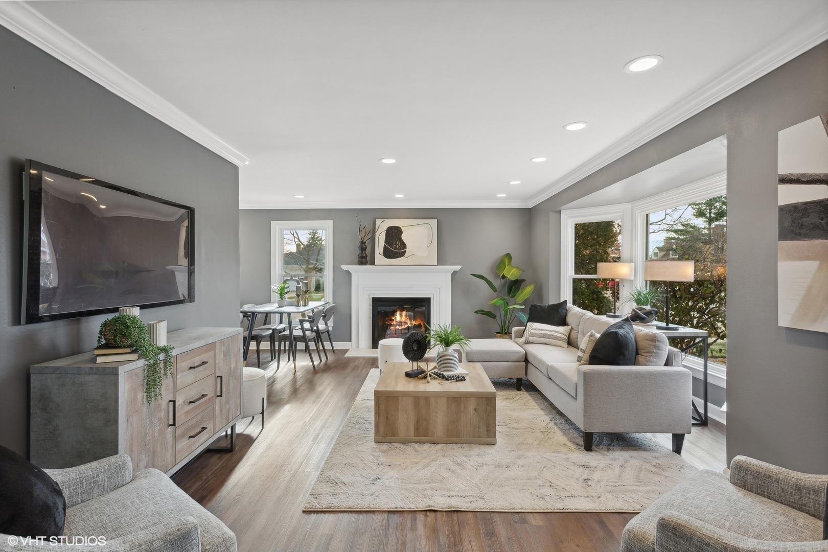 8501 Harding Avenue Skokie, IL 60076 - Photo 5 of 37 a living room with furniture and a fireplace