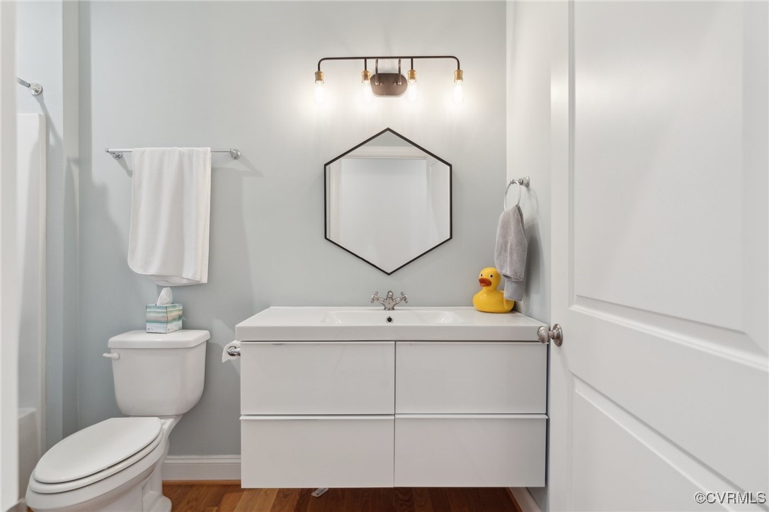 13279 Hanover Courthouse Road Hanover, VA 23069 - Photo 31 of 50 Bathroom featuring toilet, vanity, baseboards, and