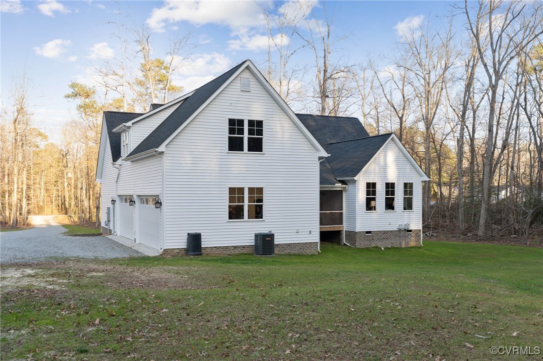 13279 Hanover Courthouse Road Hanover, VA 23069 - Photo 47 of 50 Rear view of property with a garage, a lawn, grave