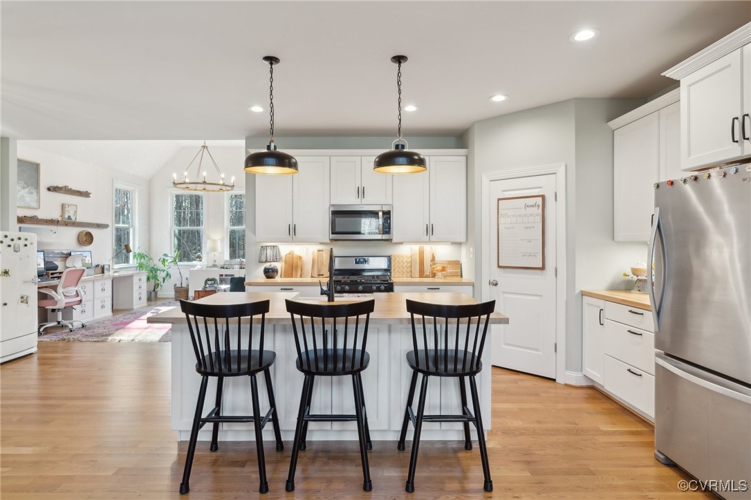 13279 Hanover Courthouse Road Hanover, VA 23069 - Photo 9 of 50 Kitchen with stainless steel appliances, a breakfa
