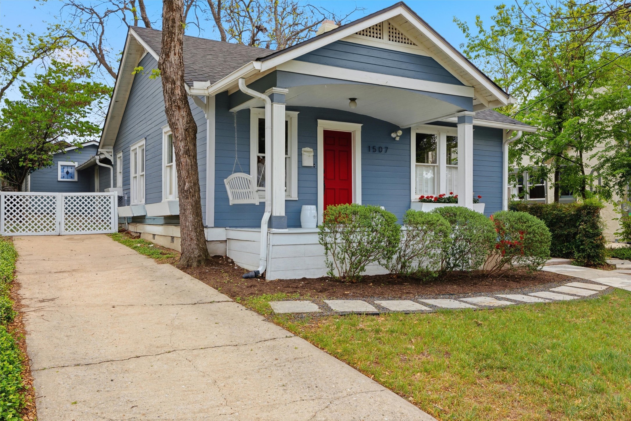 1507 Wethersfield Road Austin, TX 78703 - Photo 2 of 40 a front view of a house with a garden
