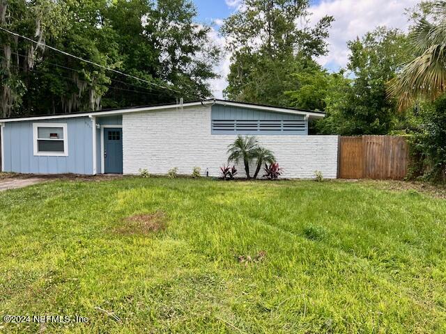 6937 Rollo Road Jacksonville, FL 32205 - Photo 1 of 26 a view of a back yard of the house