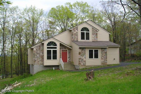 21 Old Timber Road Mount Pocono, PA 18344 - Photo 1 of 8 a front view of a house with a yard