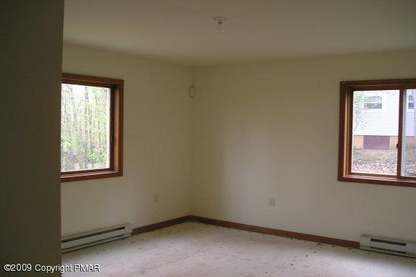 21 Old Timber Road Mount Pocono, PA 18344 - Photo 4 of 8 an empty room with a window