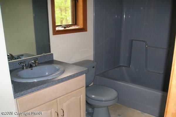 21 Old Timber Road Mount Pocono, PA 18344 - Photo 8 of 8 a bathroom with a sink toilet and shower