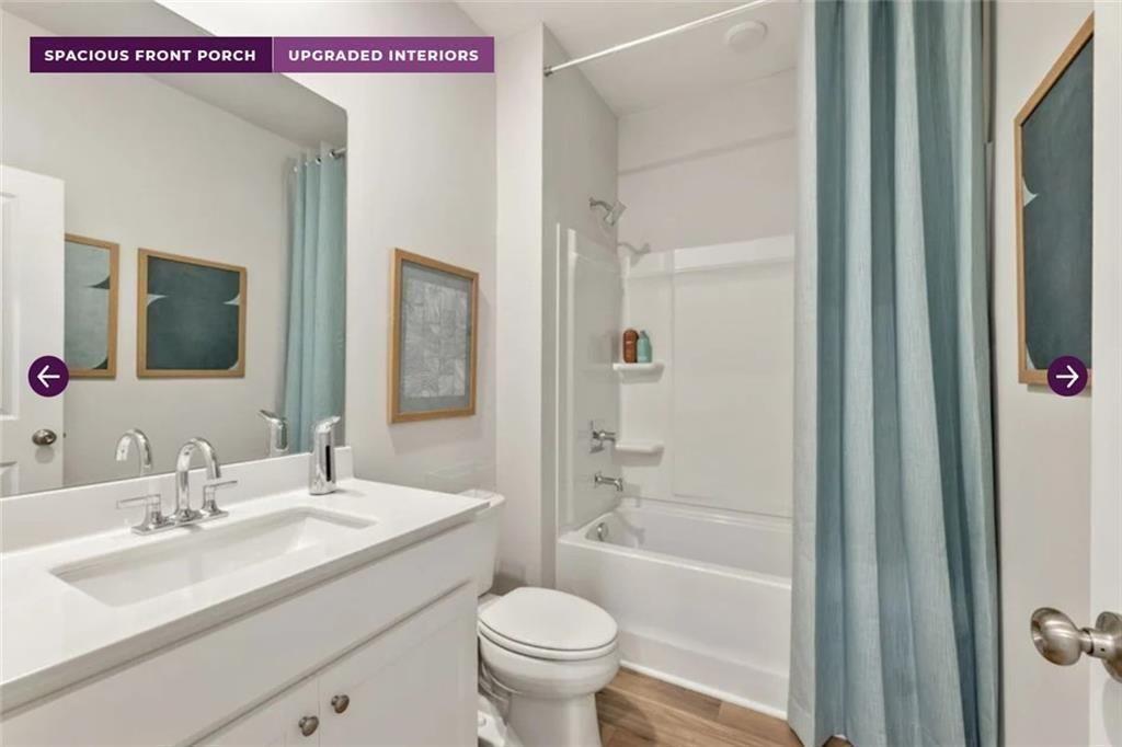 134 Poplar Blf Way Jefferson, GA 30549 - Photo 13 of 31 a bathroom with a sink a toilet and shower