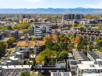 a view of a city with mountains