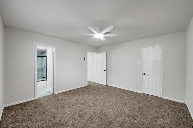 a house view with a sitting space and garden