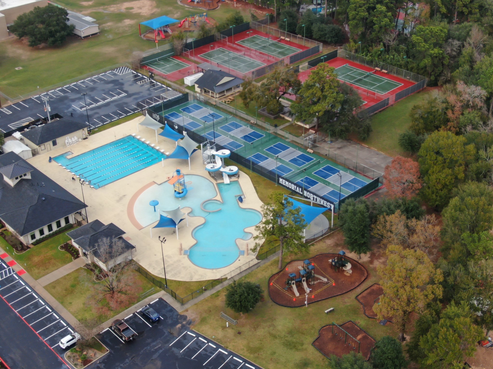 7610 Theisswood Road Spring, TX 77379 - Photo 40 of 42 an aerial view of a house swimming pool and outdoor seating