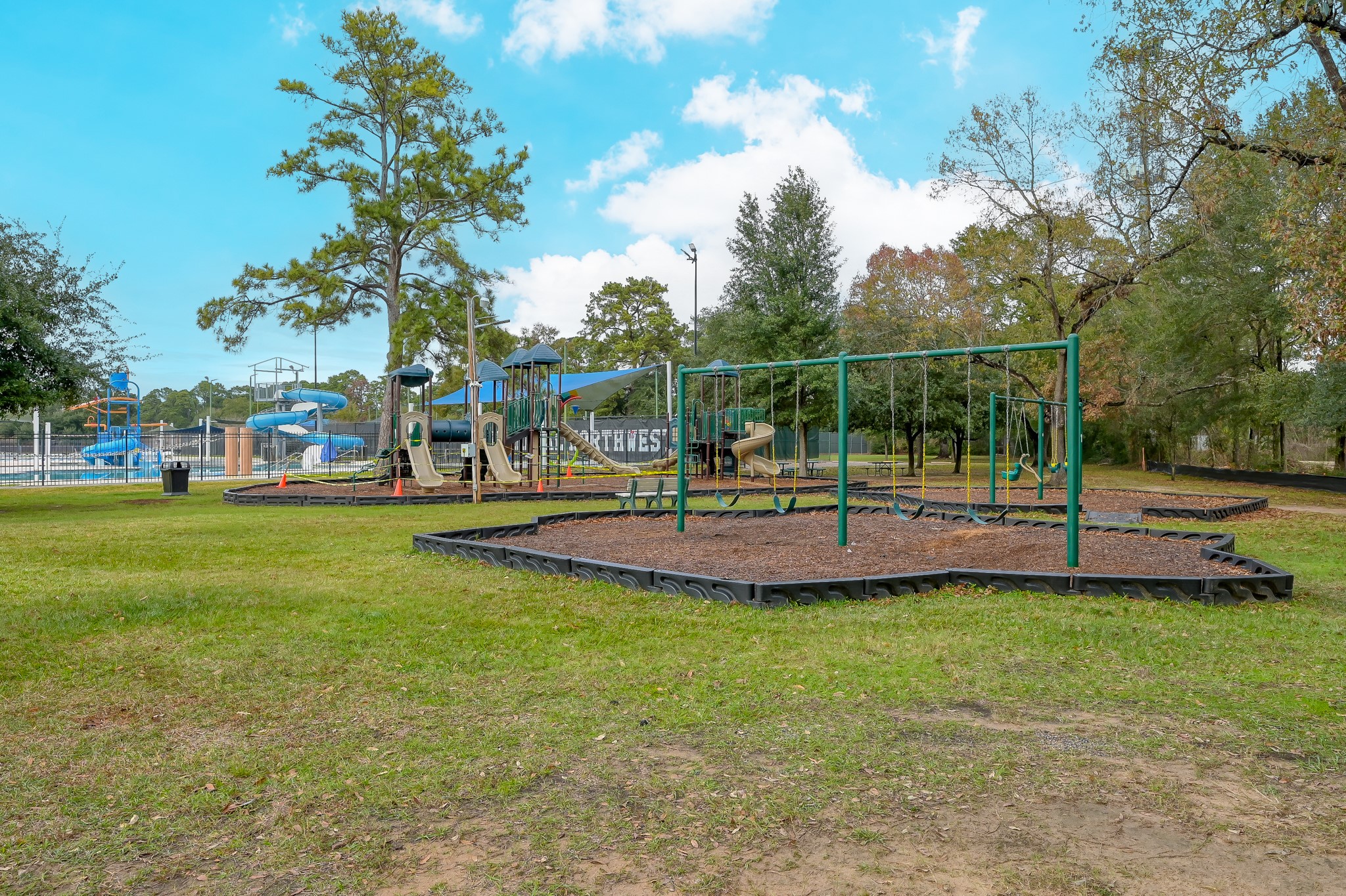 7610 Theisswood Road Spring, TX 77379 - Photo 42 of 42 a view of a park with swings