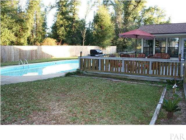 4714 Shell Road Milton, FL 32583 - Photo 1 of 22 Pool Deck and Florida Room
