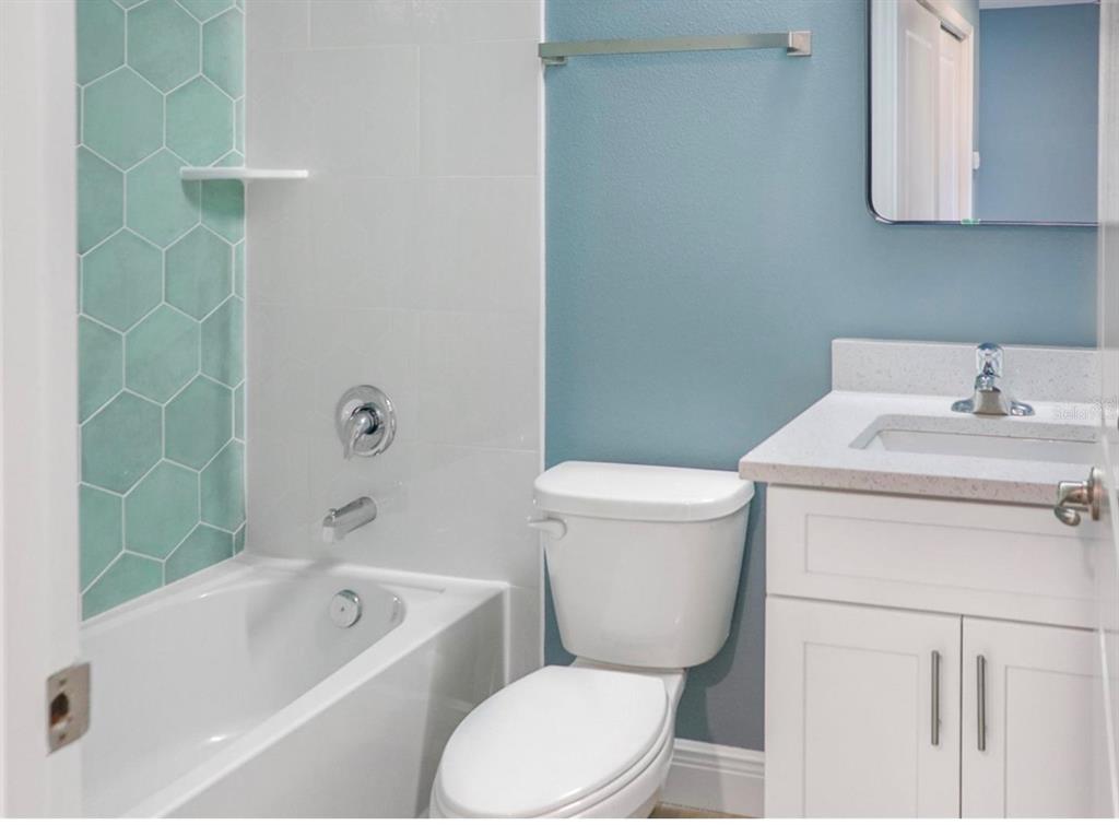 2005 Guava Drive Edgewater, FL 32141 - Photo 12 of 14 a bathroom with a sink toilet and bathtub