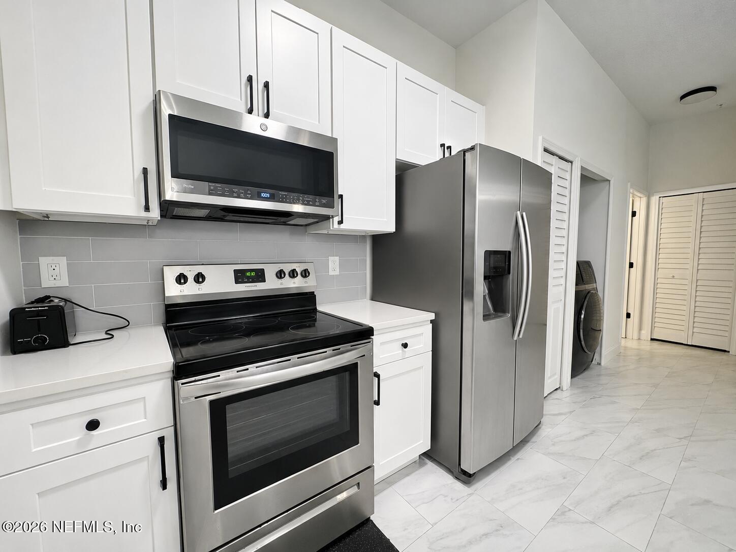 7920 Merrill Road, Unit 1205 Jacksonville, FL 32277 - Photo 3 of 25 Kitchen