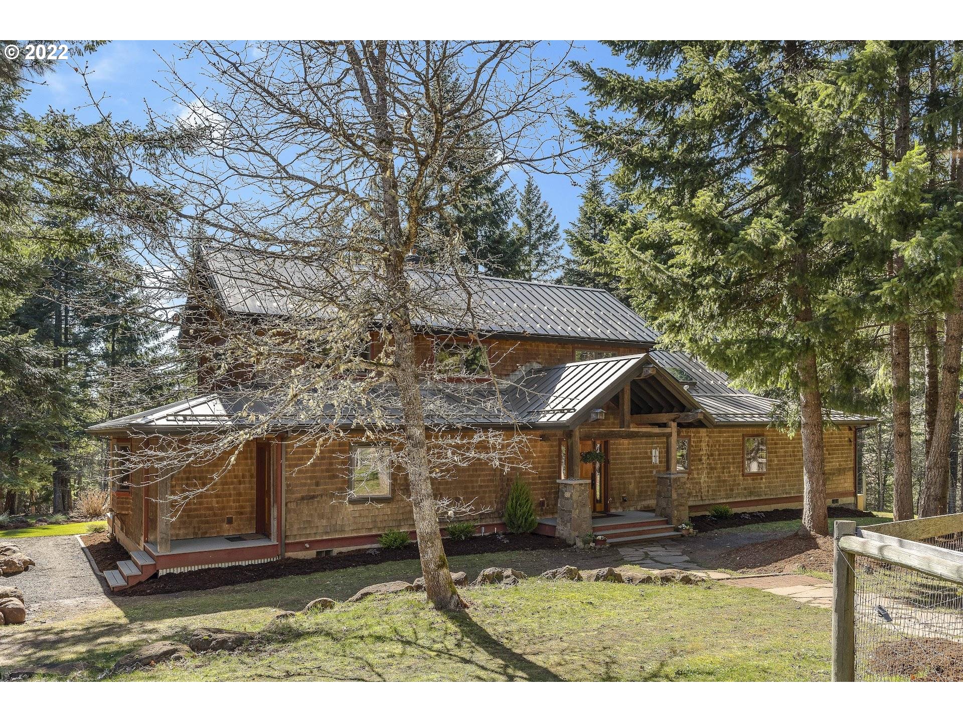 a view of house with yard