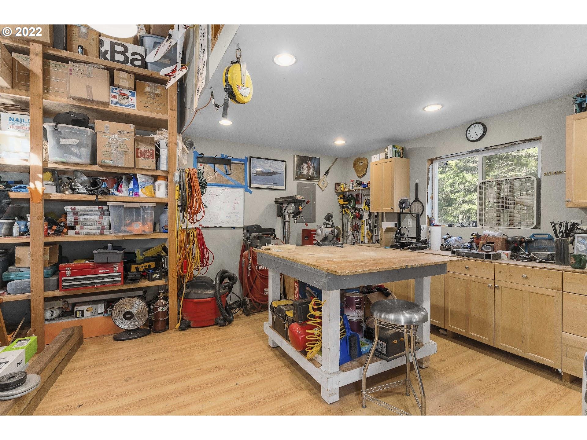 181 Lyons Road White Salmon, WA 98672 - Photo 25 of 32 a kitchen with stainless steel appliances granite countertop a stove and a cabinets