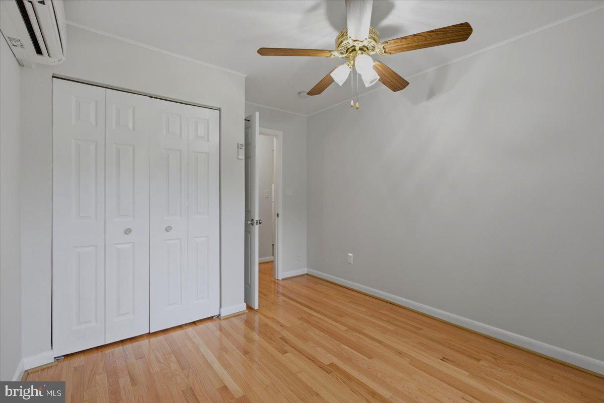 7 E Research Road Greenbelt, MD 20770 - Photo 14 of 17 Primary Bedroom