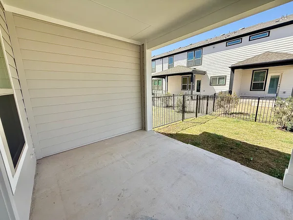 a view of backyard of a house