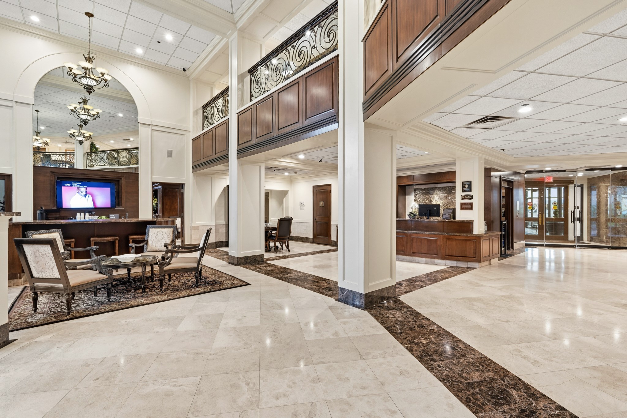 3525 Sage Road, Unit 1204 Houston, TX 77056 - Photo 22 of 25 Another view of the building’s common area highlighting open layout and gathering spaces.