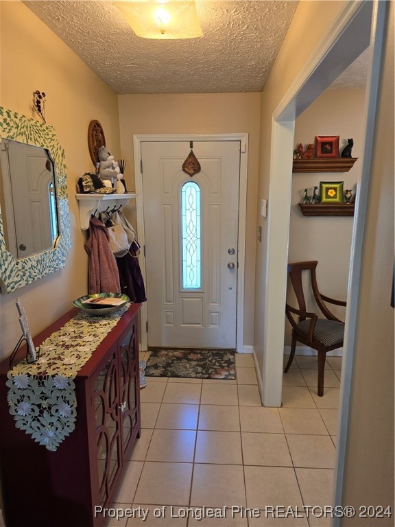 7605 Elliott Bridge Road Spring Lake, NC 28390 - Photo 3 of 36 a view of a entryway door of the house