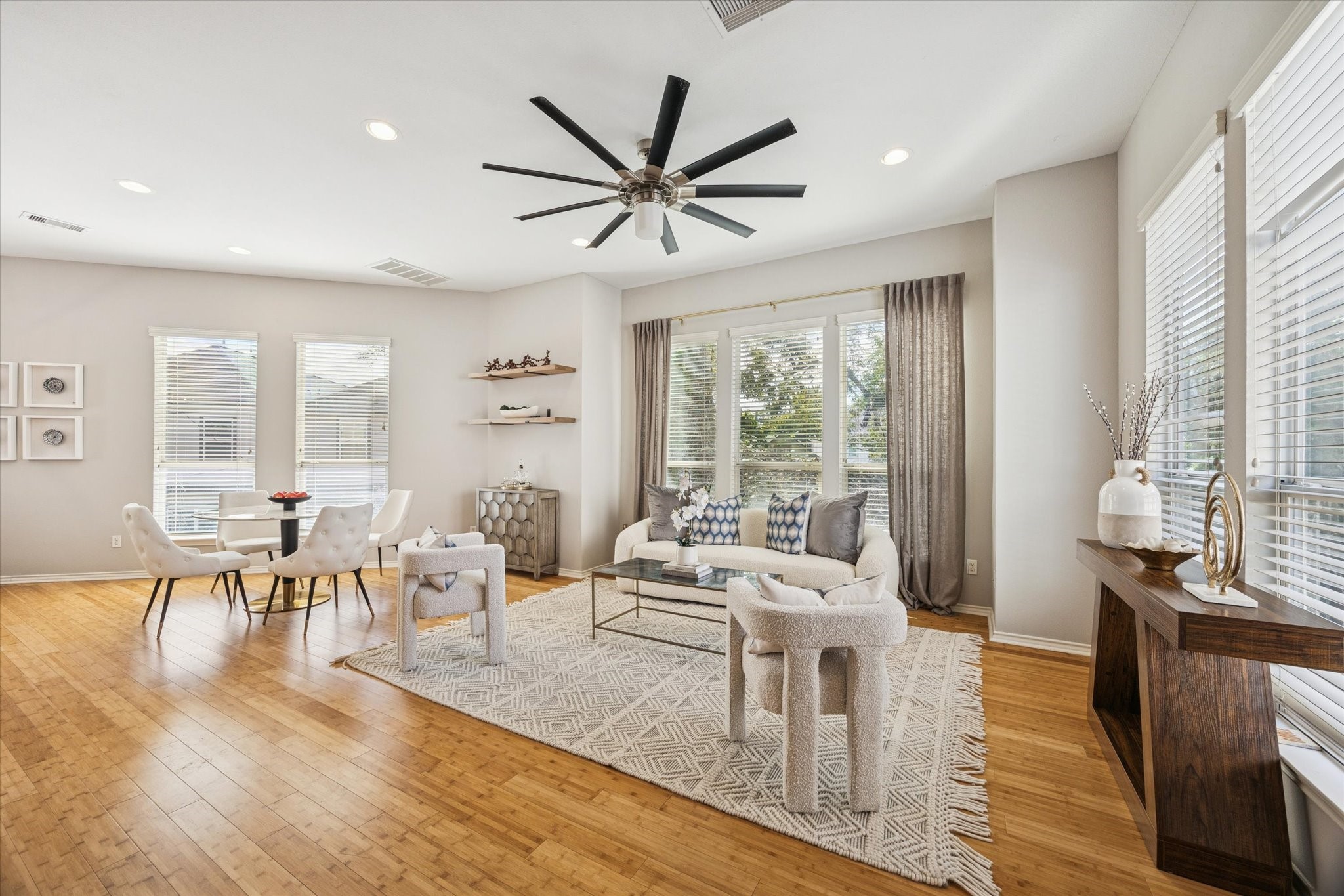 2607 Link Road Houston, TX 77009 - Photo 12 of 21 Sophisticated and warm Family Room connected to the Dining space and Kitchen with walls of windows