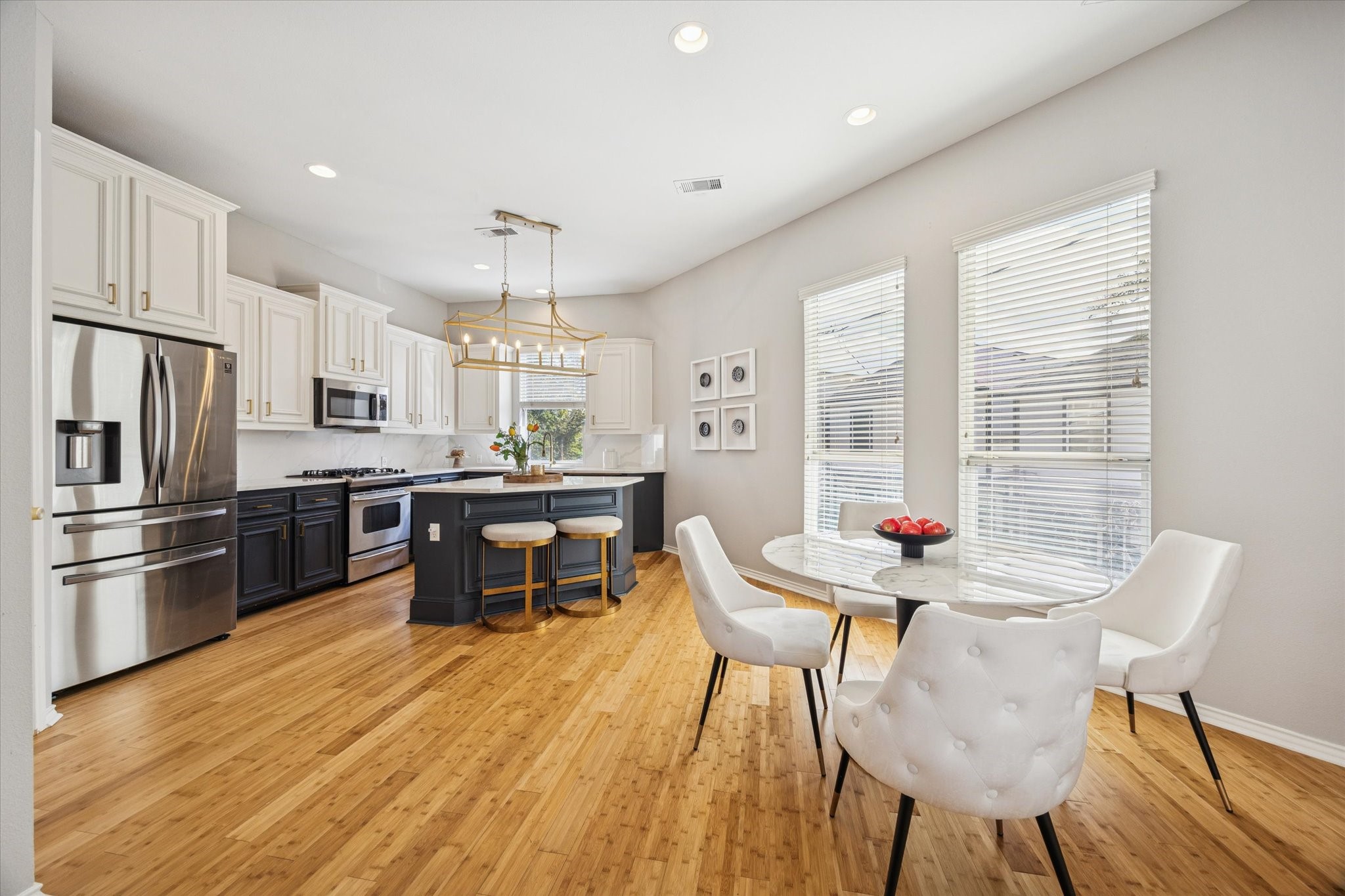 2607 Link Road Houston, TX 77009 - Photo 8 of 21 The open and inviting second floor features all of the living spaces with gorgeous hardwood floors