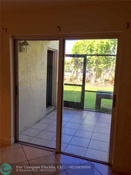 3321 Quail Close Pompano Beach, FL 33064 - Photo 8 of 9 a view of front door