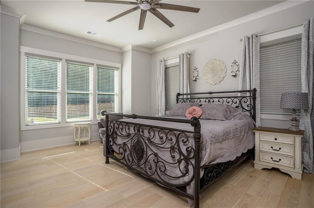 255 Old Town Road Dacula, GA 30019 - Photo 25 of 38 a bedroom with a bed and window