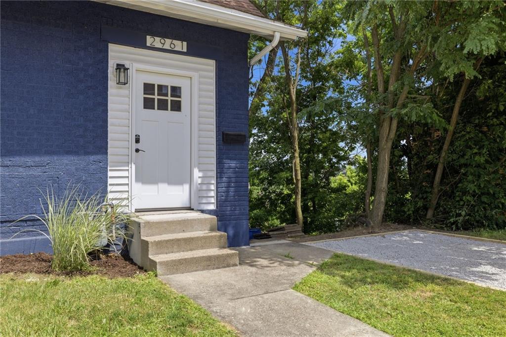 2961 Ruthwood Avenue Pittsburgh, PA 15227 - Photo 4 of 29 a front view of a house with a yard