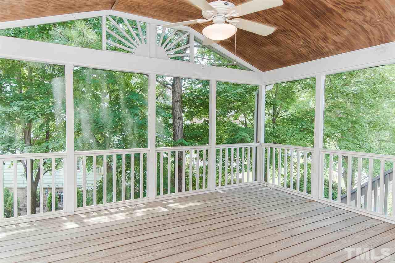 9001 Winged Thistle Court Raleigh, NC 27617 - Photo 17 of 25 a view of a balcony with wooden floor