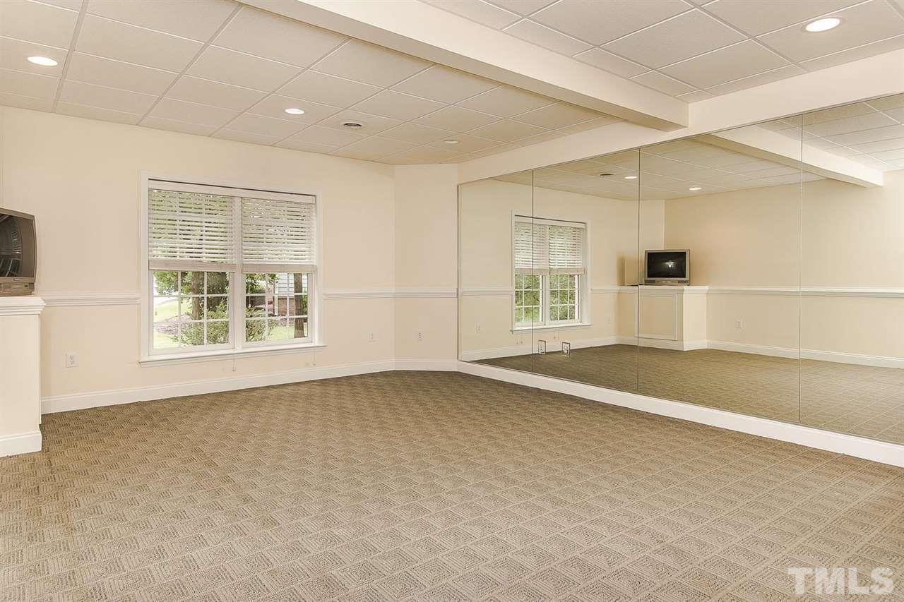 9001 Winged Thistle Court Raleigh, NC 27617 - Photo 22 of 25 an empty room with windows