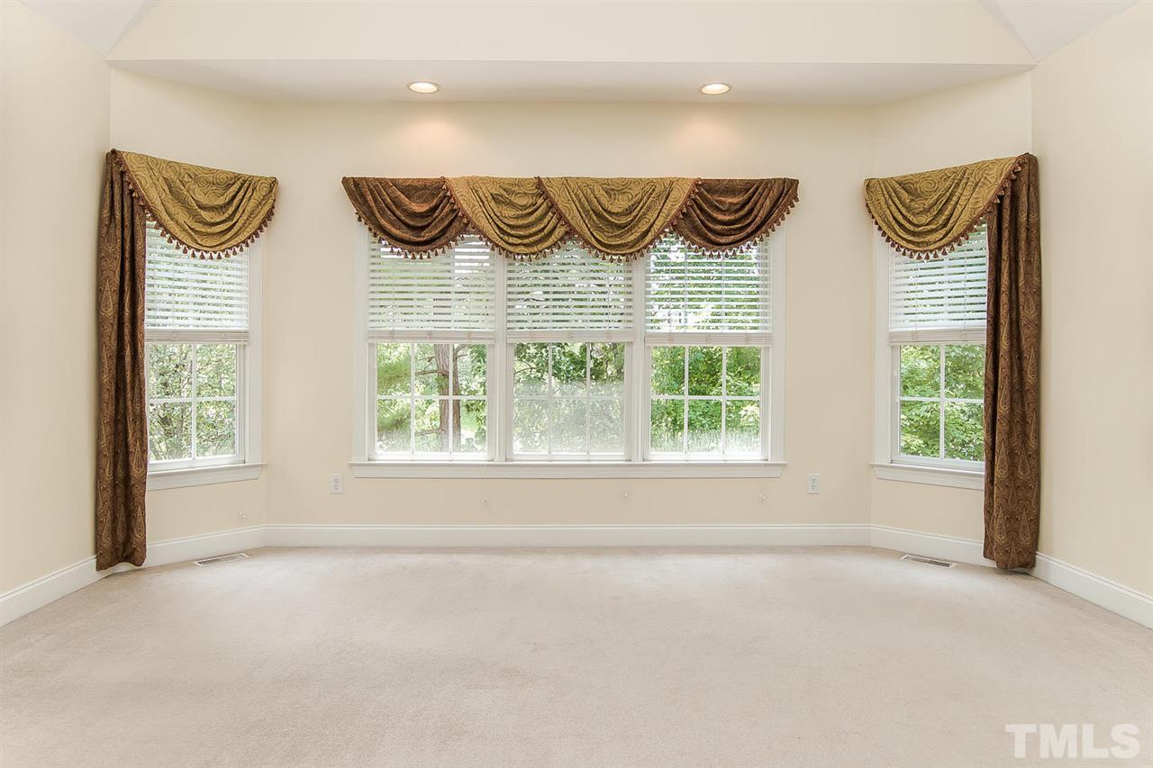 9001 Winged Thistle Court Raleigh, NC 27617 - Photo 10 of 25 a view of a utility room with a window