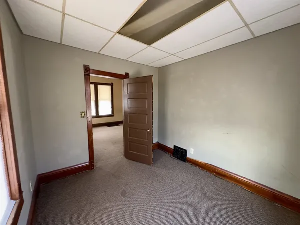 an empty room with windows