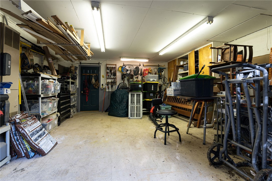 31 Raccoon Hill Road West Greenwich, RI 02817 - Photo 44 of 48 There is also more storage through the door on the back wall