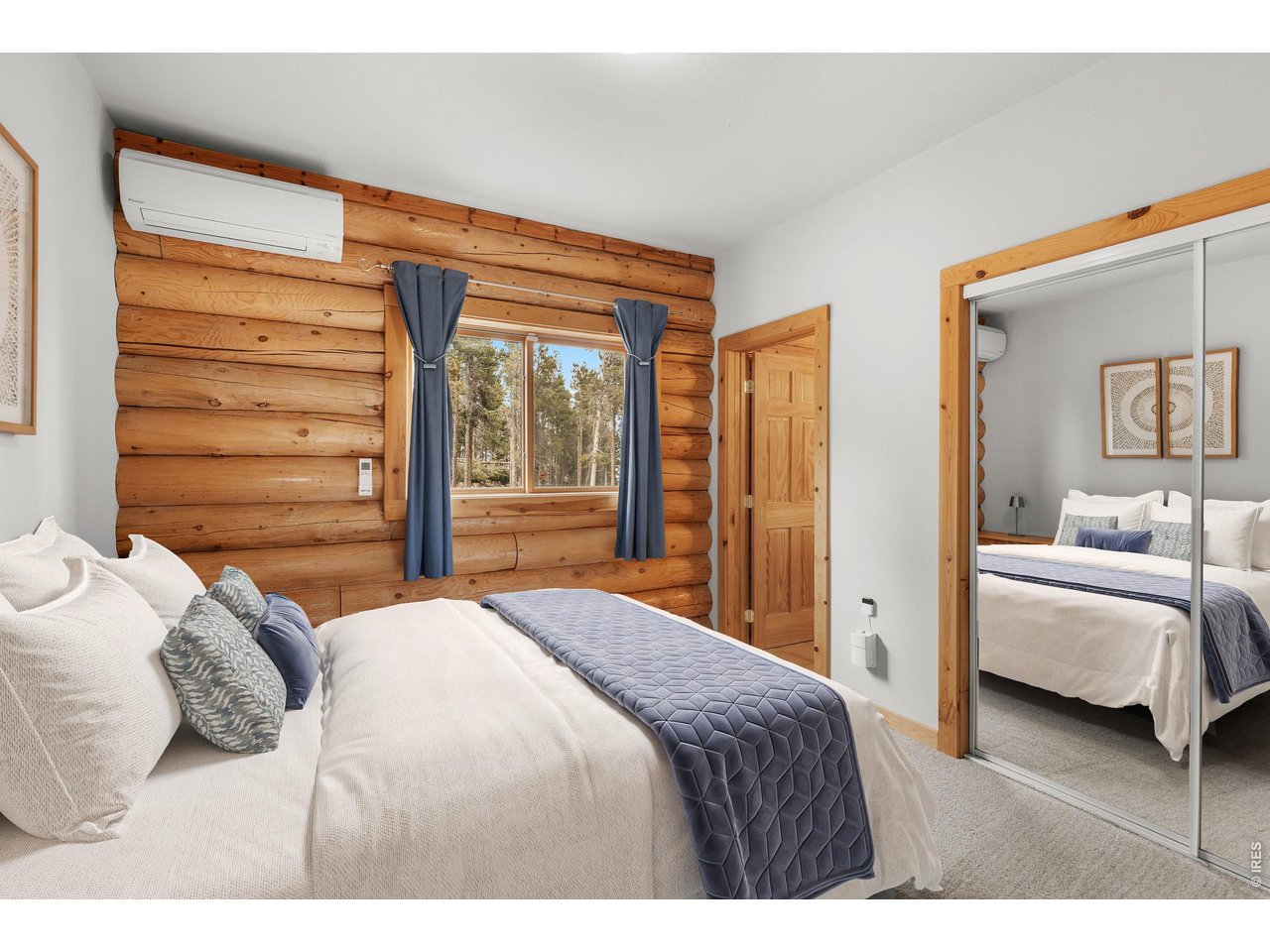 1028 Rudi Lane Golden, CO 80403 - Photo 39 of 46 a bedroom with a bed and a view living room