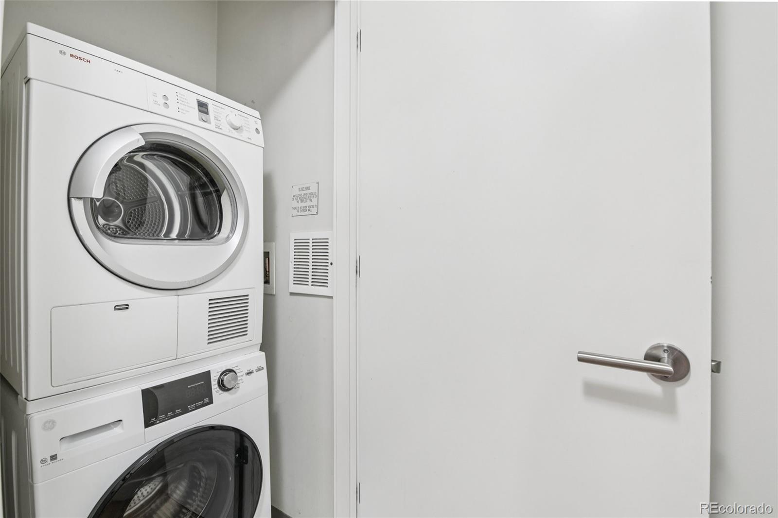410 Acoma Street, Unit 206 Denver, CO 80204 - Photo 11 of 37 a utility room with dryer and washer
