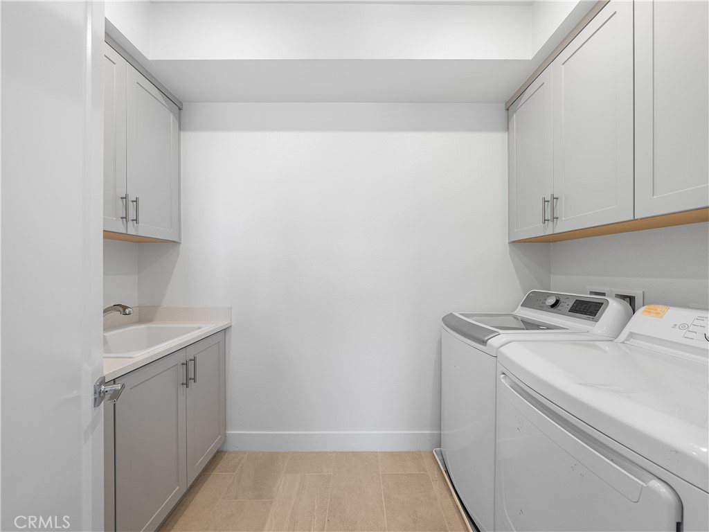 191 Lynx Irvine, CA 92618 - Photo 15 of 24 a view of utility room with washer and dryer