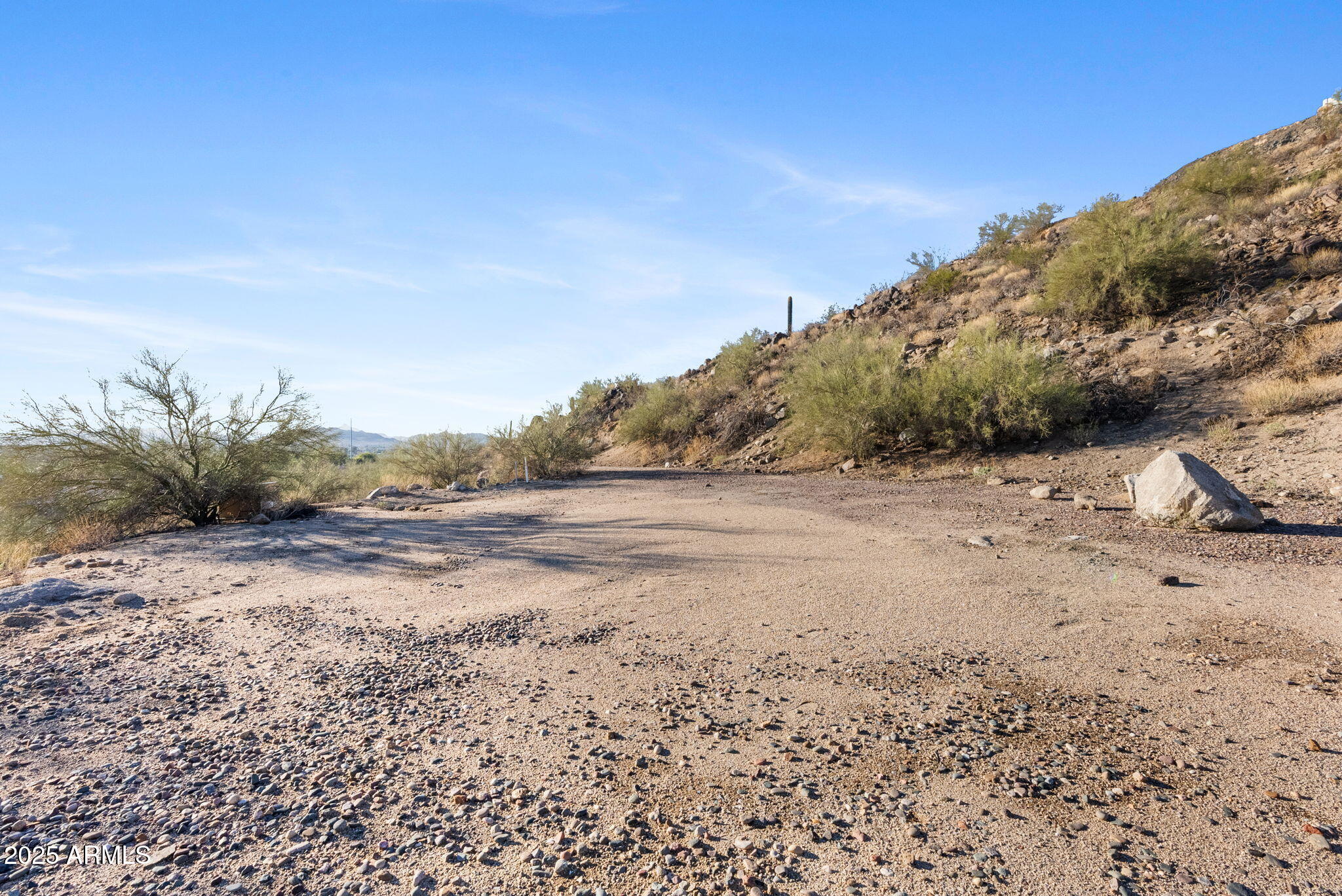 18908 North 22nd Street Phoenix, AZ 85024 - Photo 16 of 19 a view of dirt field with mountain in the background