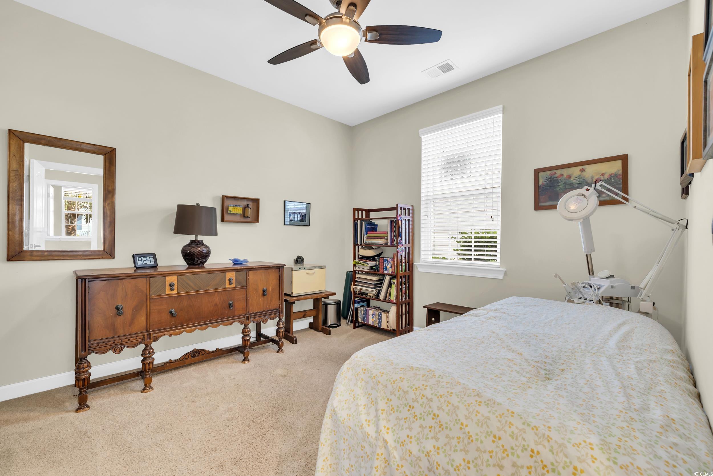 1464 Culbertson Avenue Myrtle Beach, SC 29577 - Photo 16 of 40 Bedroom with light carpet and ceiling fan