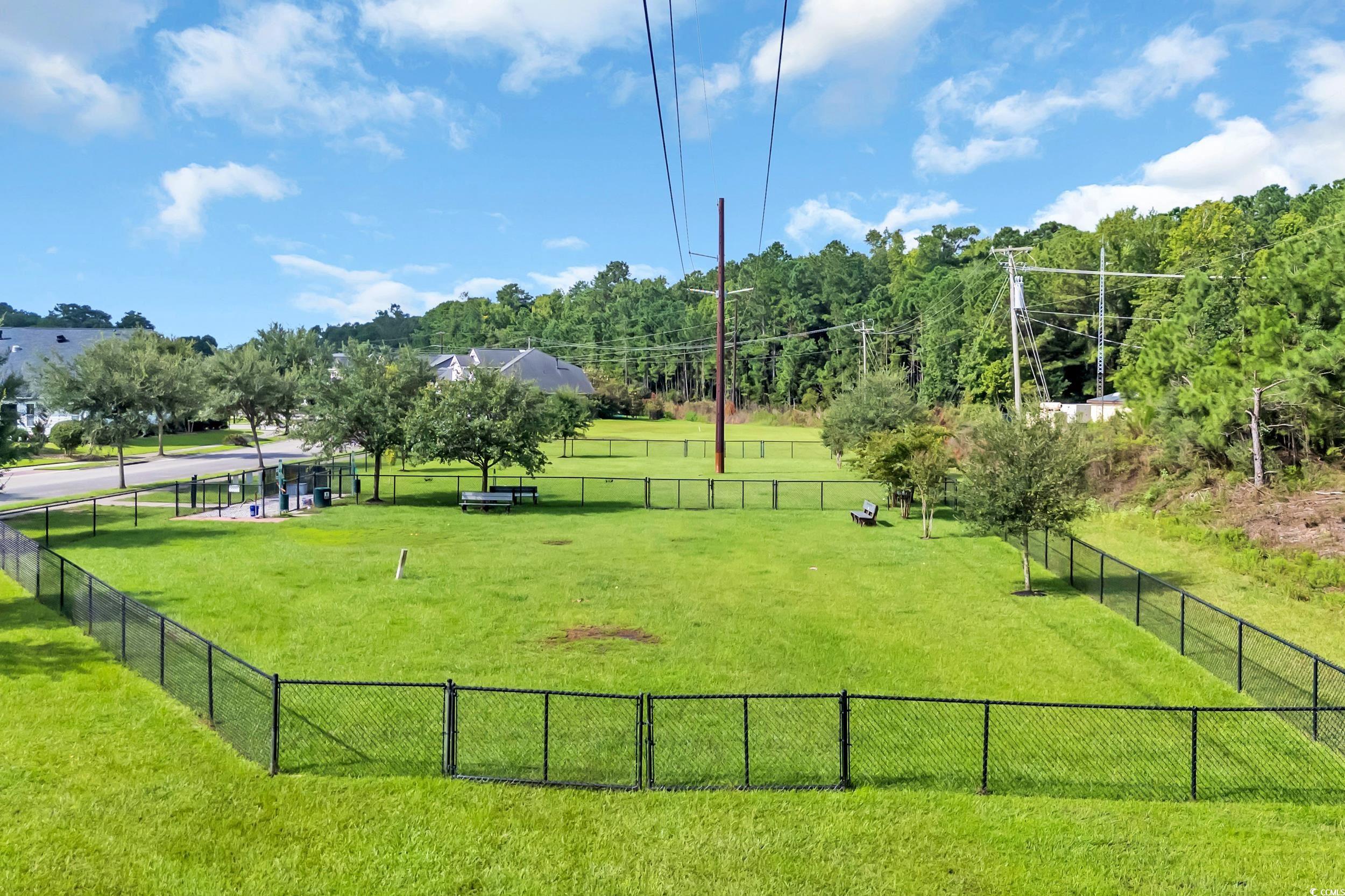1464 Culbertson Avenue Myrtle Beach, SC 29577 - Photo 38 of 40 Surrounding community featuring a dog friendly area and view of wooded area