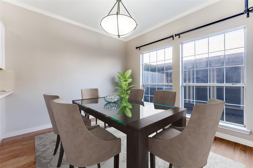 148 Cobblestone Row Denton, TX 76207 - Photo 12 of 37 a view of a dining room with furniture window and wooden floor