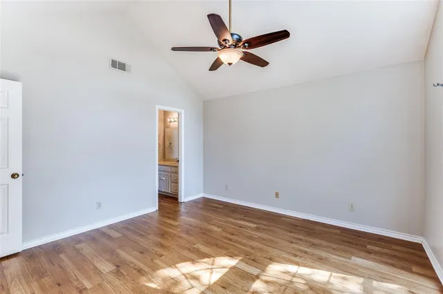 a view of room with a ceiling fan