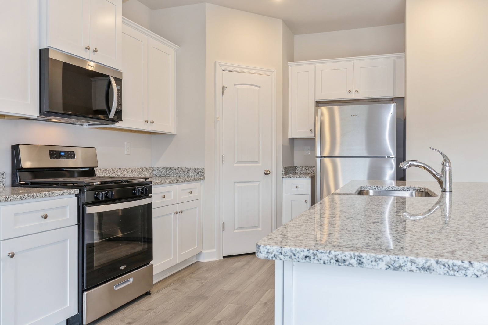 2330 Nabali Way Murfreesboro, TN 37127 - Photo 20 of 28 a kitchen with stainless steel appliances granite countertop a stove a microwave and refrigerator