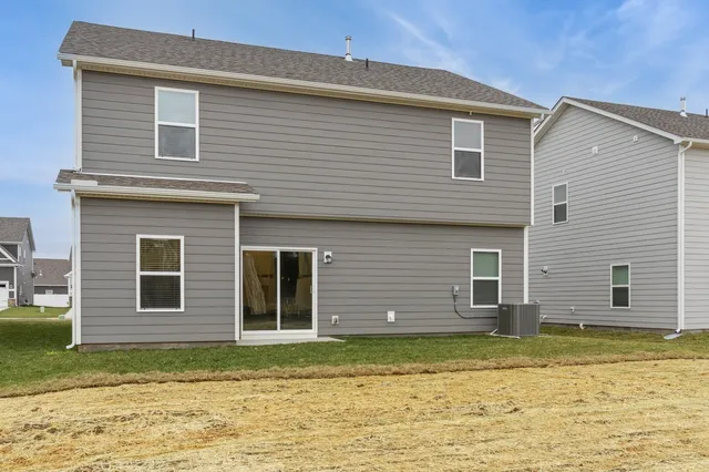 a view of a house with a swimming pool