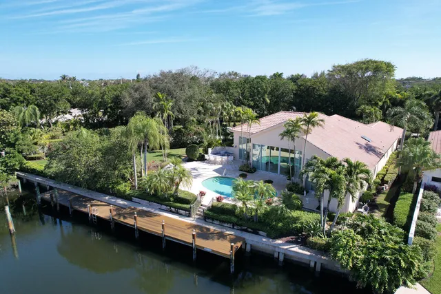 an aerial view of a house with a garden space