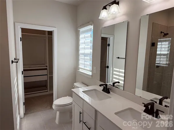 a bathroom with a shower and a bathtub