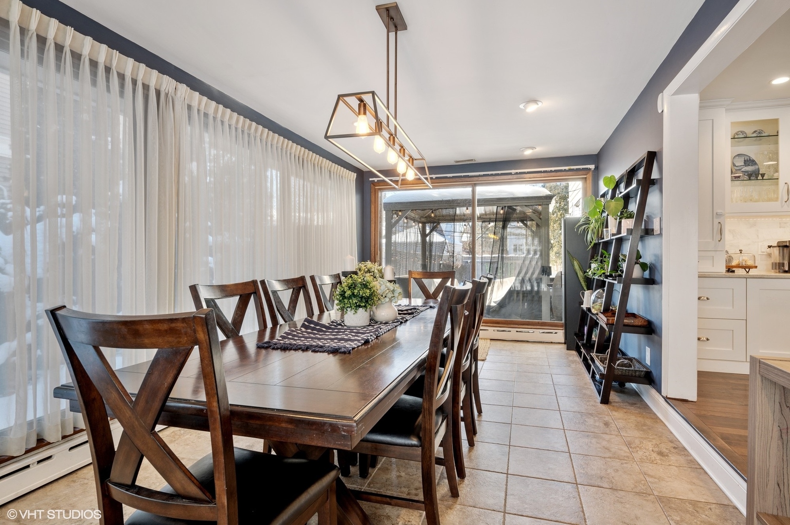 730 Forest Road Glenview, IL 60025 - Photo 13 of 37 a view of a dining room with furniture and window